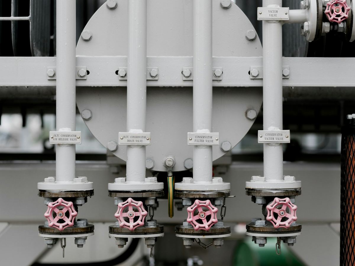 Vertical pipe runs with isolation valves in a mechanical space