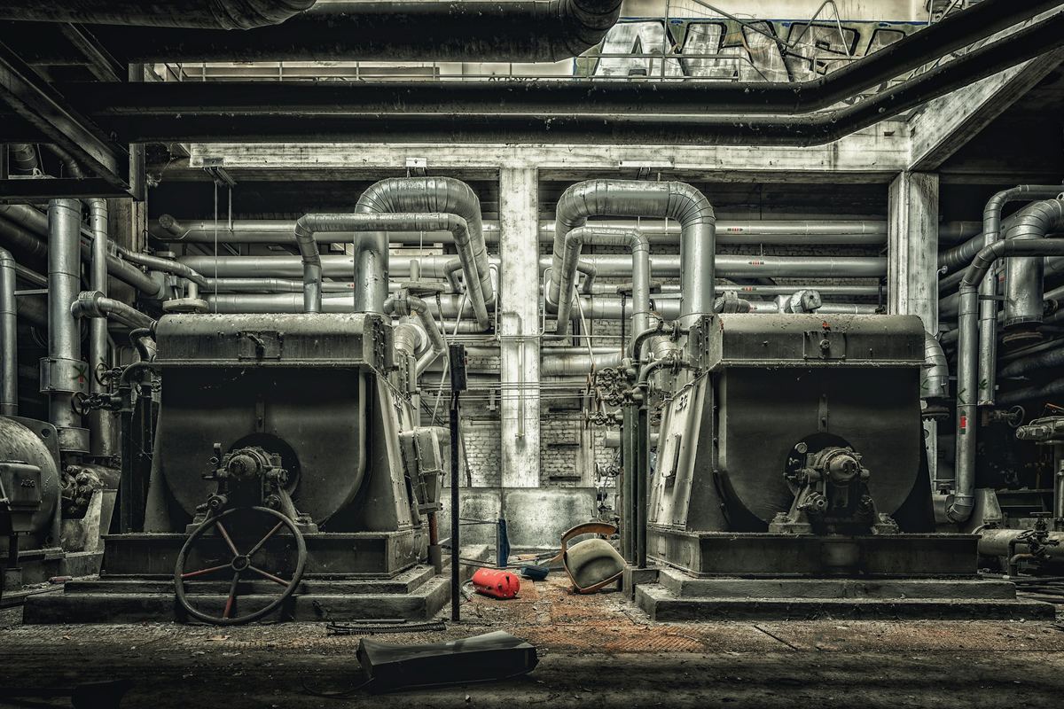 Pumps, piping and valves inside a mechanical room